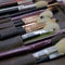 Professional makeup brushes and tools, make-up products set. Theme of fashion style. Square frame background