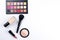 Professional makeup products with cosmetic beauty products, foundation, lipstick,  eye shadows, eye lashes, brushes and tools