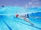 Professional male athlete swimming in pool