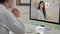 Professional male and female designers meeting planning with video conferencing