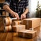 Professional Man Packing and Taping Boxes on Table - Efficient Storage and Moving Concep