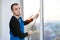 Professional master at repair and installation of windows, changes rubber seal gasket in pvc windows