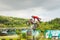 A professional motorcycle rider giving a free style motorcross acrobatics demonstration in Shenzhen Zoo park, in China