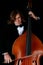 Professional musician playing on a contrabass