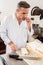 Professional nougat maker eating his fresh batch before slicing