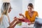 Professional nutritionist meeting a patient in the office. young smiling female nutritionist in the consultation room.