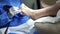 Professional pedicure. Podologist give a procedure of cleaning the toes of a customer. Close up. The concept of podology and chiro