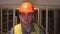 Professional people at work, portrait of architect with safety helmet in construction site