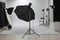 Professional photographic studio set with flashlights and white