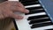 Professional piano player close-up studio playing Midi keyboard