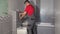Professional plumber man flush water from tube of toilet flushing mechanism