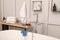 Professional plumbing tools and installed water tap in bathroom