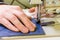 Professional production sewing machine close-up, leather production, hand seamstress