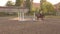 Professional rider on a horse jumps over a barrier