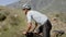 Professional road cyclist on bicycle in mountains