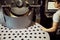 Professional roaster controlling work of coffee roasting machine