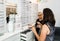 A professional salesperson helps a woman to choose reading glasses in an optometric shop in Nahariyya city in Israel