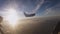 Professional skydivers fly in airplane. Sunset. Porthole. Prepare jump. Extreme