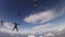 Professional skydivers in uniform free falling in sky. Hold balance. Sunny.