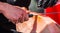 Professional slicing jamon serrano, traditional Spanish ham