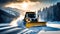 Professional snow removal in winter, a large professional snow blower clears the road of snow and ice,