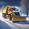 Professional snow removal in winter, a large professional snow blower clears the road of snow and ice,