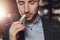 Professional sommelier waiter examining smell of wine cork