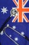 A professional stethoscope perched on a vibrant Australian flag, a symbol of the country's strong healthcare system. Medical