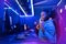 Professional Streamer African young woman cyber gamer in neon color blur background