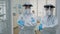 Professional team of dentists in ppe suits standing