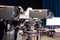 Professional television camera with large lens on a tripod during TV recording