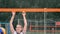 Professional volleyball serve woman on the beach tournament. Volleyball net the player blocks the view when applying