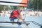 Professional waterman training on lake with catamaran