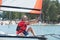 Professional waterman training on lake with catamaran