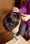 Professional Wig Maker in her Workshop.