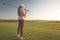 Professional woman golf player on the golf ground ready for playing golf, sport concept