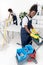 professional young african american cleaners with cleaning equipment