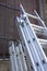 Professionals ladders folded stand over old town building