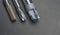 professoinal multi cutting tools special set. drill, endmill, cutter. Material carbide. Used for metalwork. Isolated on dark