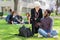 Professor and Student Working Together Outdoors