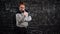 Professor writes equation on blackboard full of mathematics formulas and points finger smiling