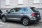 Profil view of grey Volkswagen Tiguan parked in the street