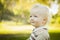 Profile of Adorable Blonde Baby Boy Outdoors