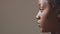 Profile of african american female face. Pensive focused black woman, close-up studio portrait, copy space. ProRes codec
