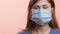 Profile of girl removing protective medical mask from the face, fight against the epidemic of coronavirus is over, behavior of the