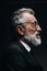 Profile headshot of grey haired scientist listening report in formal black suit