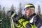 Profile of a male nordic skier in a cross-country race