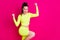 Profile photo of astonished celebrating adorable young lady stand fists up yell dress sport suit isolated on vibrant