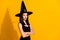 Profile photo of cute lovely young sorceress lady crossed arms serious look prepare evil potion destroy world wear black