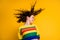 Profile photo of funny careless girl close eyes wind blow hairdo wear striped cropped sweater isolated yellow color